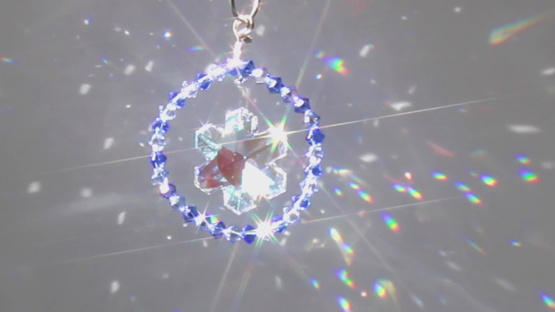 Snowflake Crystal Ornament, Pendulum & Suncatcher, Rainbow Maker, Light Catcher, Hanging Crystals For Feng Shui Decor Aurora Borealis video